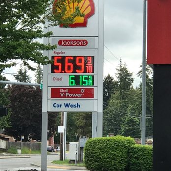 Shell Food Mart - a gas station sign and a car wash sign - Gas Stations Near Me - Renton, Washington