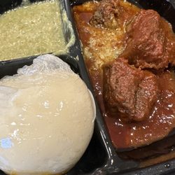 Pounded yam, okra stew and 2 piece beef. Jollaf rice and beef