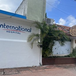 Look for the round sign in front of the small office Look for the round sign in front of the small office