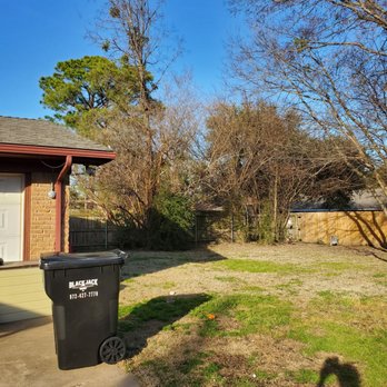 Legacy Tree Service - a trash can in the yard - Tree Services Near Me Legacy Tree Service - a trash can in the yard - Tree Services Near Me