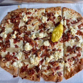 Obed & Isaac's Microbrewery and Eatery - Honey, goat (cheese), and bacon flatbread--crust is thin enough NOT to fill you up, just perfection on the pan. - American Near Me - Springfield, Illinois Obed & Isaac's Microbrewery and Eatery - Honey, goat (cheese), and bacon flatbread--crust is thin enough NOT to fill you up, just perfection on the pan. - American Near Me - Springfield, Illinois