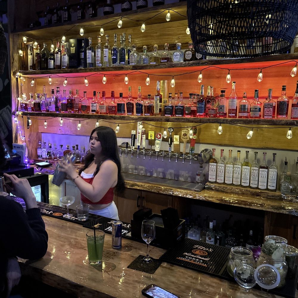 MPM Tiki Bar - Bartender Tiff holding it down at the back bar - Asian Fusion Near Me - Glen Allen, Virginia MPM Tiki Bar - Bartender Tiff holding it down at the back bar - Asian Fusion Near Me - Glen Allen, Virginia