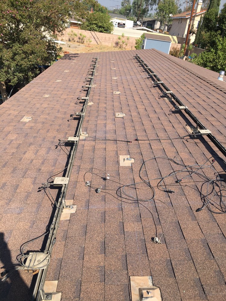 Slide of Lopez Roofing