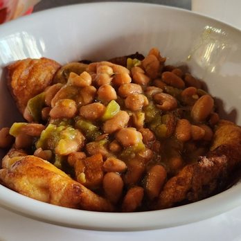 Old Town Cafe - Chile relleno pair topped by whole beans. - New Mexican Cuisine Near Me - Albuquerque, New Mexico