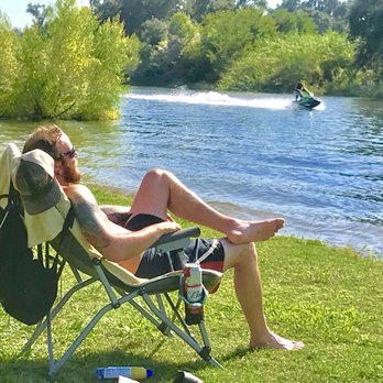 Riverland Rv Resort - Workin on his tan by the river - Resorts Near Me - Kingsburg, California Riverland Rv Resort - Workin on his tan by the river - Resorts Near Me - Kingsburg, California