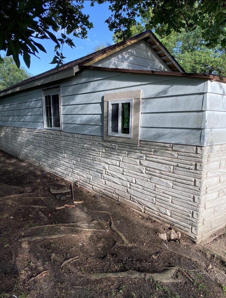 Slide of Quality King Roofing