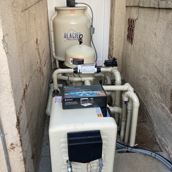 Sunset Outdoor Creations - Pool equipment (tight space but they made it work). Pool chiller is the massive piece in the back) - General Contractors Near Me - Corona, California Sunset Outdoor Creations - Pool equipment (tight space but they made it work). Pool chiller is the massive piece in the back) - General Contractors Near Me - Corona, California
