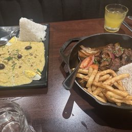 Aji de gallina and lomo saltado. Aji de gallina could have used a little more meat, but the flavor was excellent Aji de gallina and lomo saltado. Aji de gallina could have used a little more meat, but the flavor was excellent