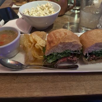 Solo - a sandwich and a bowl of soup on a table - Bars Near Me - Seattle, Washington Solo - a sandwich and a bowl of soup on a table - Bars Near Me - Seattle, Washington