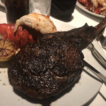 Fleming’s Prime Steakhouse & Wine Bar - Prime Tomahawk* and lobster tail side - Steakhouses Near Me - Tucson, Arizona Fleming’s Prime Steakhouse & Wine Bar - Prime Tomahawk* and lobster tail side - Steakhouses Near Me - Tucson, Arizona