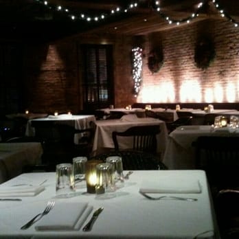 Sidecar - a dimly lit dining room with tables and chairs - American Near Me - New York, New York Sidecar - a dimly lit dining room with tables and chairs - American Near Me - New York, New York