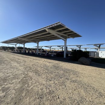 Tesla Supercharger - 4 rows of charging stalls - EV Charging Stations Near Me - Coalinga, California Tesla Supercharger - 4 rows of charging stalls - EV Charging Stations Near Me - Coalinga, California