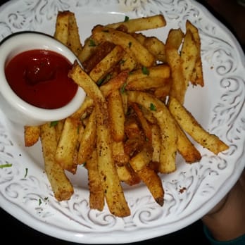 Headquarters Beercade River North - Fries  @$6,made with bbq spice,  parmesan?  & truffle  oil. - Bars Near Me - Chicago, Illinois