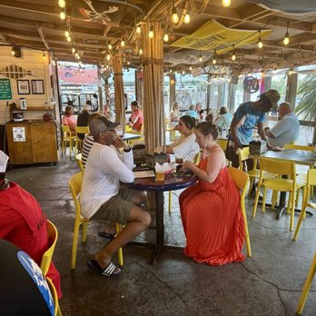 McConkey's Jungle Shack - Dining porch seating - Burgers Near Me - Edisto Beach, South Carolina McConkey's Jungle Shack - Dining porch seating - Burgers Near Me - Edisto Beach, South Carolina