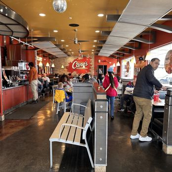 Raising Cane's Chicken Fingers - customers in a busy restaurant - Fast Food Near Me - Dallas, Texas Raising Cane's Chicken Fingers - customers in a busy restaurant - Fast Food Near Me - Dallas, Texas