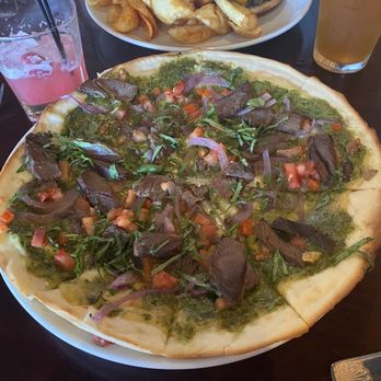 Tin Roof Grill - White bean and steak pizza on Gluten Free crust. - New American Near Me - Sandy, Utah Tin Roof Grill - White bean and steak pizza on Gluten Free crust. - New American Near Me - Sandy, Utah