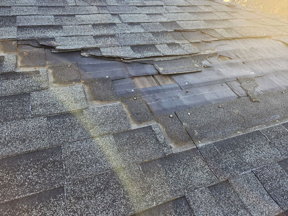 Slide of Spikes Roofing