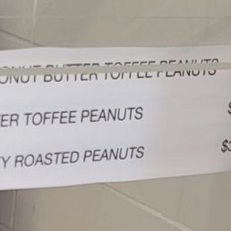 Menu prices for peanuts that are on the other side of the counter