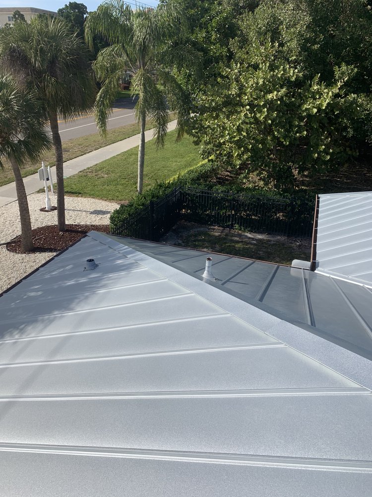Slide of E&C Roofing and More