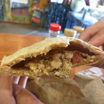 World Beat Cafe - Inside of the spicy tofu Jamaican patty (THIS ONE IS SO GOOOOD WITH THEIR HOTSAUCE HOT DAMN) - Caribbean Near Me - San Diego, California World Beat Cafe - Inside of the spicy tofu Jamaican patty (THIS ONE IS SO GOOOOD WITH THEIR HOTSAUCE HOT DAMN) - Caribbean Near Me - San Diego, California