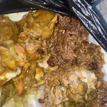 Carri Fresh Jamican - The chicken leg was just sitting in the spot and as you see, the rice is dry - Caribbean Near Me - Union City, Georgia