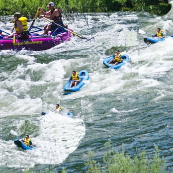 Morrisons Rogue Wilderness Adventures - IK fun while family kicks it on the raft. - Rafting/Kayaking Near Me - Merlin, Oregon