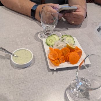Aga's Restaurant & Catering - Complimentary cucumber and carrot slices with sauce - Pakistani Near Me - Houston, Texas