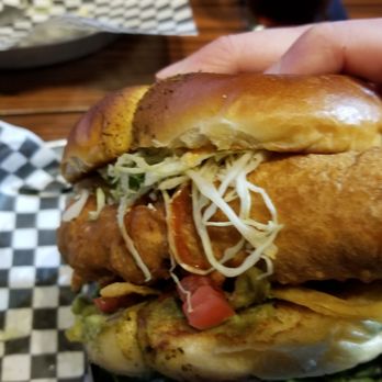 The Loose Moose - Baja Fish Sandwich (Side-view) - Sports Bars Near Me - Toronto, Ontario The Loose Moose - Baja Fish Sandwich (Side-view) - Sports Bars Near Me - Toronto, Ontario