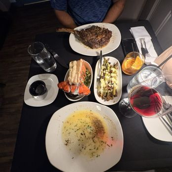 Bowdie's Chophouse - Saugatuck - Tomahawk for two Lobster tail Caymus Cab Sav Old Fashioned Worcestershire add on  Asparagus with hollandaise and shallots - Steakhouses Near Me - Saugatuck, Michigan