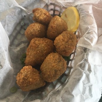 Middendorf's - Manchac - Spicy Crawfish Poppers. Super bland. - Seafood Near Me - Akers, Louisiana Middendorf's - Manchac - Spicy Crawfish Poppers. Super bland. - Seafood Near Me - Akers, Louisiana