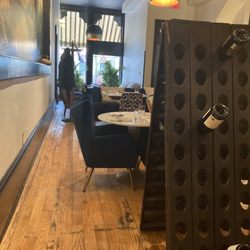 H2 Huth & Harris Wine Merchants - Canton - Seating options and wine rack wall divider