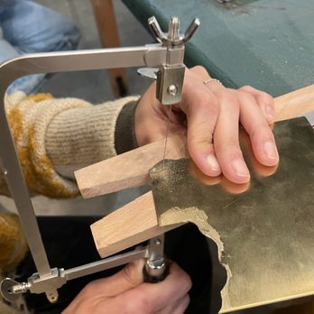 Element Art Center - My friend working on sawing out her nu gold pendant made in the "Brass Jewelry Workshop" - Art Classes Near Me - Los Angeles, California Element Art Center - My friend working on sawing out her nu gold pendant made in the "Brass Jewelry Workshop" - Art Classes Near Me - Los Angeles, California