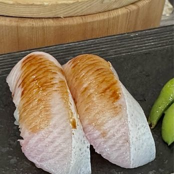 Nori Bar - Hamachi Belly nigiri. This is nicely prepared and presented, and the price for a pair is good. - Sushi Bars Near Me - Honolulu, Hawaii