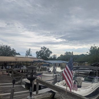 Island House - a boat docked at a dock - American Near Me - Millersport, Ohio Island House - a boat docked at a dock - American Near Me - Millersport, Ohio