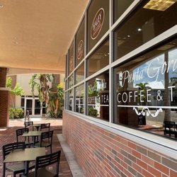 Punta Gorda Coffee & Tea - Signage covering windows so you know what's inside COFFEE AND TEA