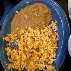 Carlos Montez Mexican Restaurant and Cantina - Look at the top of the beans. Did they plate all the beans and rice in the morning before the day started? This is horrible. Not fresh.