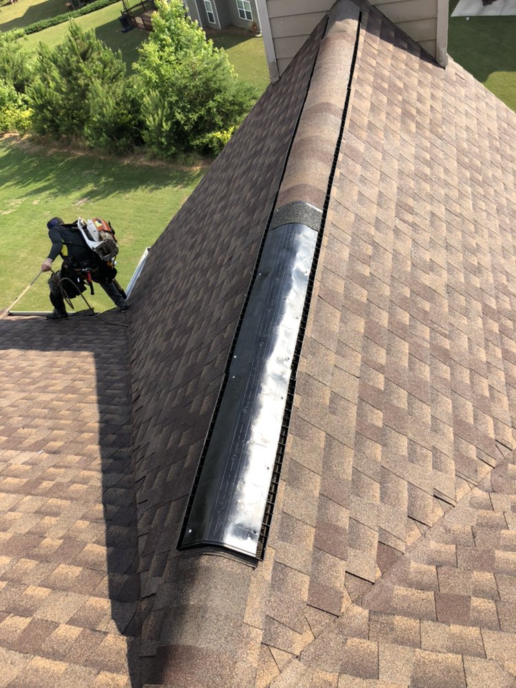 Slide of MTZ Roofing