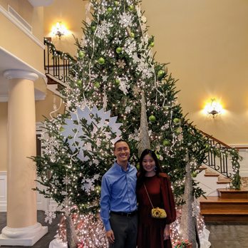 Governors Club - Inside the clubhouse in front of the large Christmas tree. - Social Clubs Near Me - Chapel Hill, North Carolina