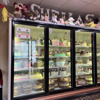 Sheila's Bakery - a display of cakes and pastries - Pizza Near Me - Detroit, Michigan Sheila's Bakery - a display of cakes and pastries - Pizza Near Me - Detroit, Michigan