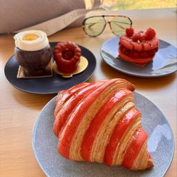 This was the strawberry croissant Raspberry Pistachio Tart coconut with mango filling This was the strawberry croissant Raspberry Pistachio Tart coconut with mango filling