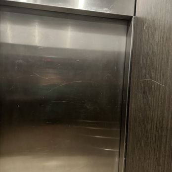 Domain San Diego - Walls in elevator scratched and tagged - Apartments Near Me - San Diego, California