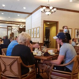 a waitress serving customers a waitress serving customers