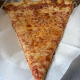 Regular size cheese slice... it was plenty big... the "Giant" size seemed too big for me. Regular size cheese slice... it was plenty big... the "Giant" size seemed too big for me.