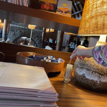 Bluebird - front desk with matches and toothpicks - Steakhouses Near Me - Banff, Alberta