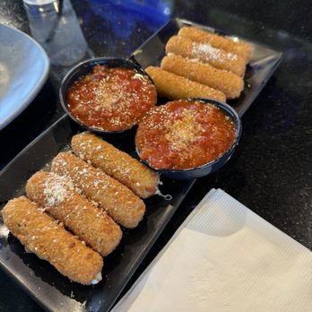 PopStroke - Fried Mozzarella sticks with marinara - Mini Golf Near Me - Fort Myers, Florida PopStroke - Fried Mozzarella sticks with marinara - Mini Golf Near Me - Fort Myers, Florida