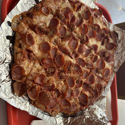 Joe's Pizzeria - Medium pepperoni and sausage pizza