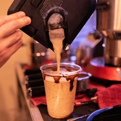 Refill Coffee Cart - The pouring of a Mocha Frappe at Refill Coffee Cart.