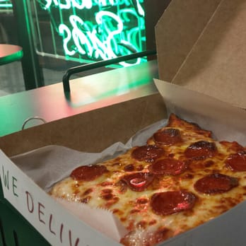 Franco's Pizza - Artsy photo with neon in background. - Pizza Near Me - Buffalo, New York Franco's Pizza - Artsy photo with neon in background. - Pizza Near Me - Buffalo, New York