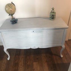 100 year old chest in excellent condition. Inside like new. Chaulk painted with 4 coats of different shades of blue and gray and waxed.