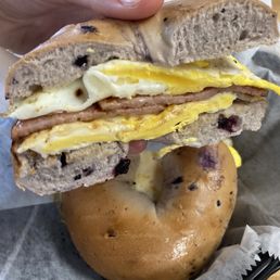 Fried Egg Sandwich with ham and a Blueberry Bagel